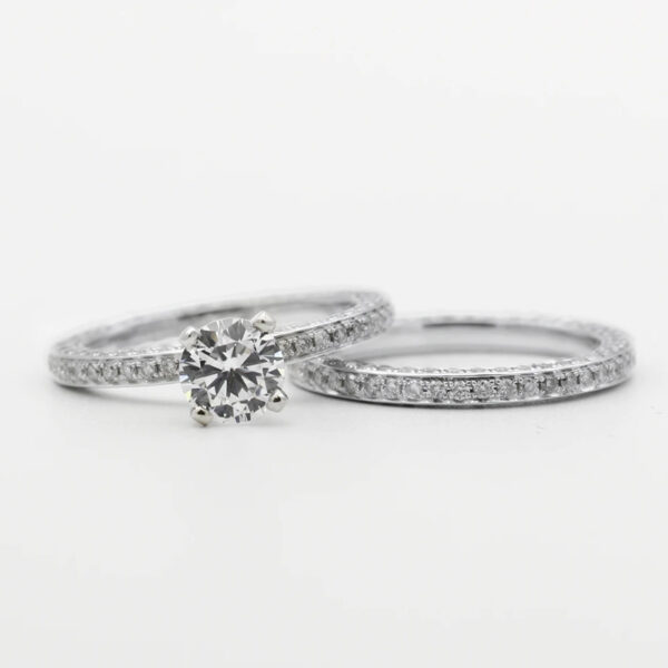 A diamond ring and band set on top of each other.