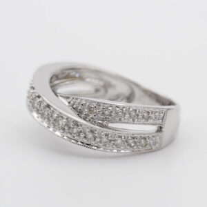 A silver ring with some diamonds on it